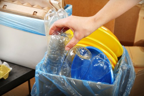 Friendly technicians performing loft clearance